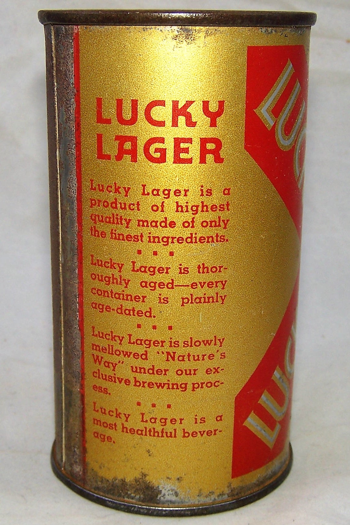 Lucky Lager Age Dated O.I can. Grade 1-/2+ Good color