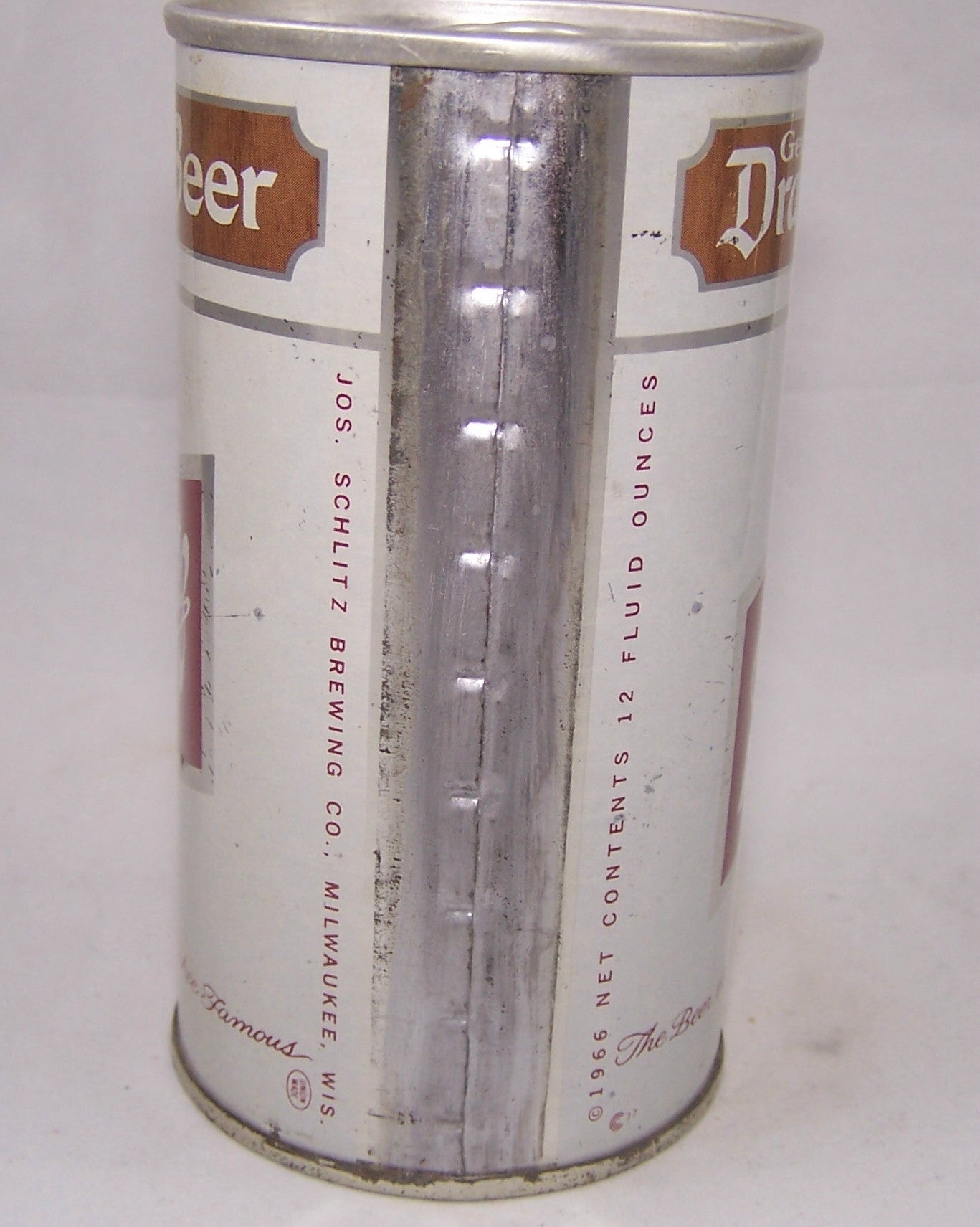 Schlitz Genuine Draught Beer, USBC II 121-04, Grade 1 or better. Sold on 07/22/16